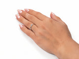 18K white gold diamond solitaire ring worn on the finger