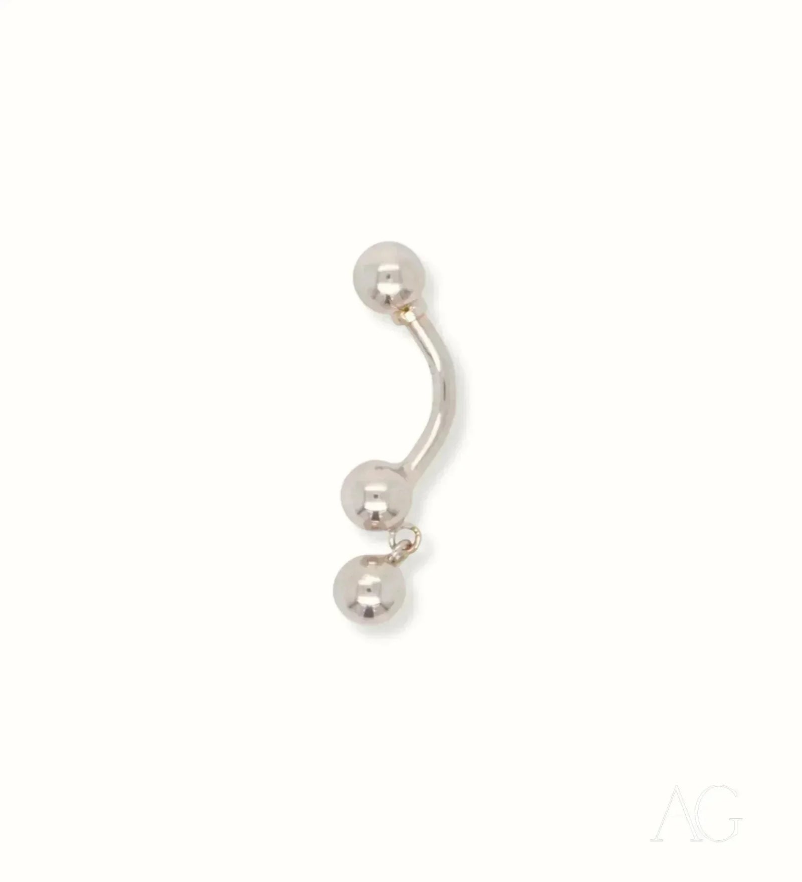 18k white gold bellybutton piercing with curved barbell and dangling bead