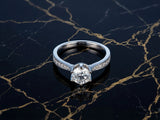 18k white gold engagement ring with 1ct round diamond and accents