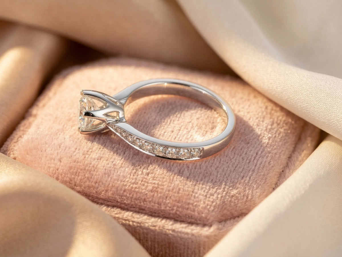 18K white gold engagement ring with 1ct solitaire diamond and pavé accents