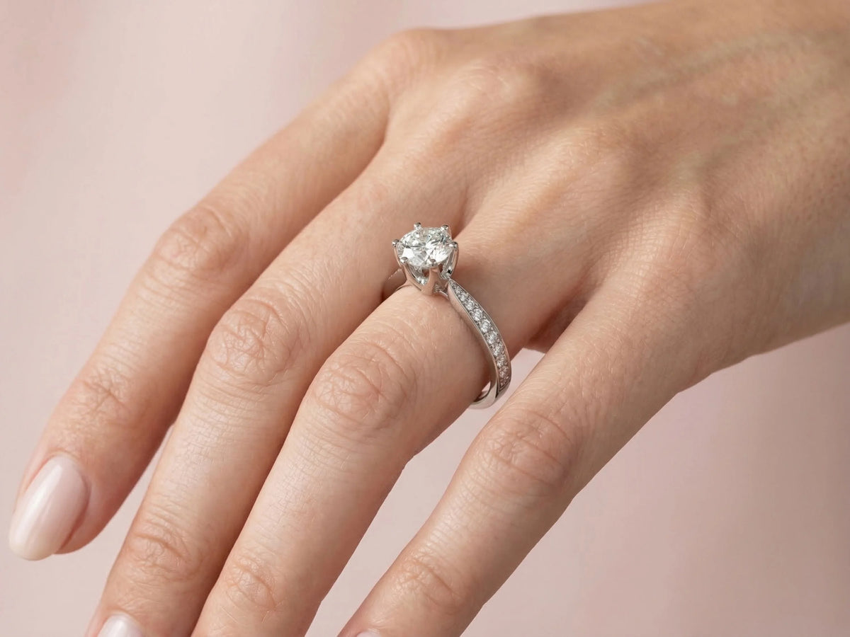 18K white gold engagement ring with 1ct solitaire diamond and pavé accents