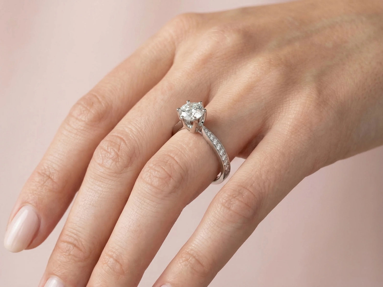 18K white gold engagement ring with 1ct solitaire diamond and pavé accents