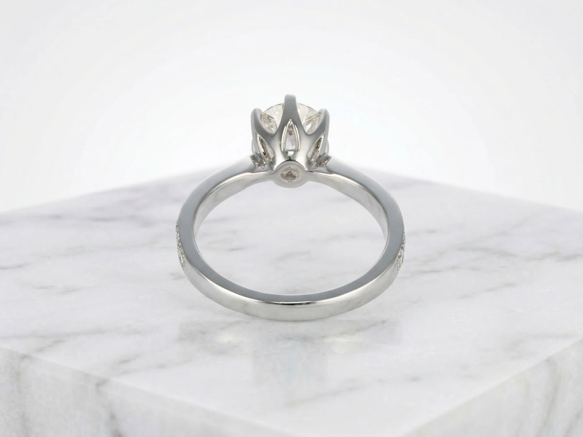 18K white gold engagement ring with 1ct marquise diamond and accents