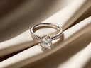 18k white gold engagement ring with 1ct round diamond accents