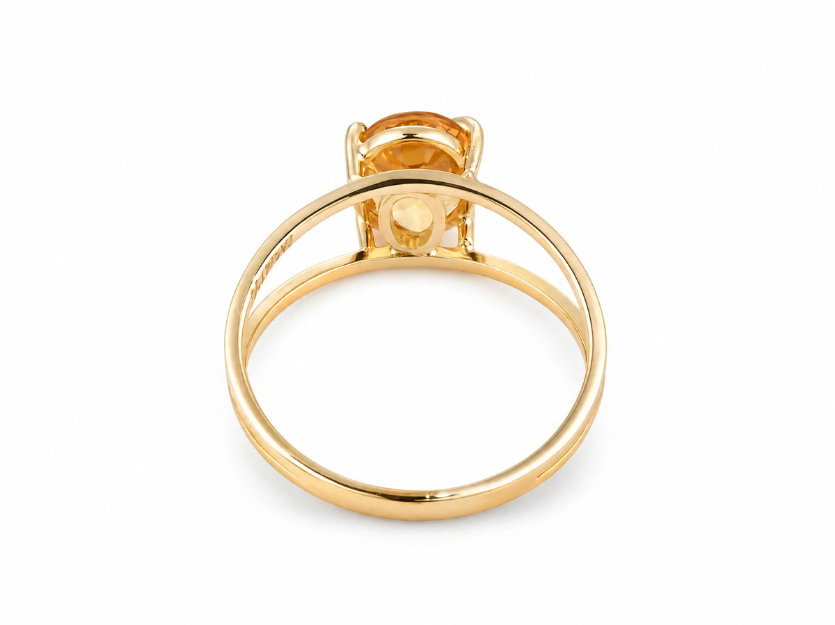18K yellow gold ArtGold citrine ring with a single faceted citrine in a four-prong open basket, front view