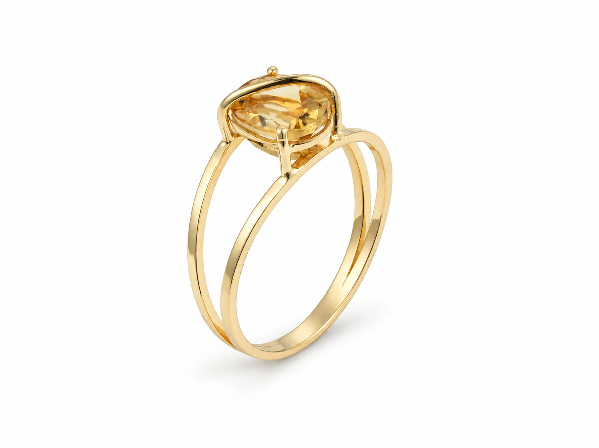 18K yellow gold ArtGold citrine ring, second three-quarter view from the opposite angle showing the split shank and open basket