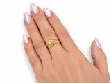 18K yellow gold ArtGold citrine ring worn on a hand