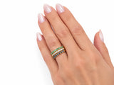 ArtGold 18K yellow gold half eternity bands worn together on the finger, close view of the diamond, emerald and sapphire rows
