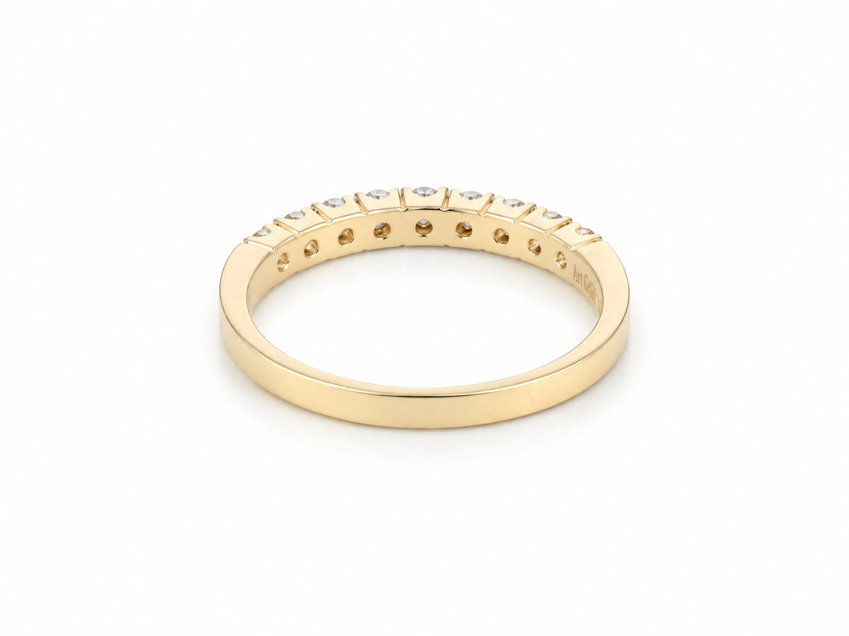 ArtGold 18K yellow gold half eternity diamond band, side profile of the band and the shared-prong setting