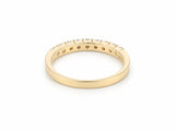 ArtGold 18K yellow gold half eternity diamond band, side profile of the band and the shared-prong setting