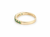 ArtGold 18K yellow gold half eternity emerald band, inside of the band showing the Art Gold 750 engraving