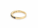 ArtGold 18K yellow gold half eternity sapphire band, inside of the band showing the Art Gold 750 engraving