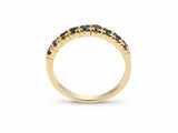 ArtGold 18K yellow gold half eternity sapphire band, upright view of the nine round dark blue sapphires in their shared-prong setting