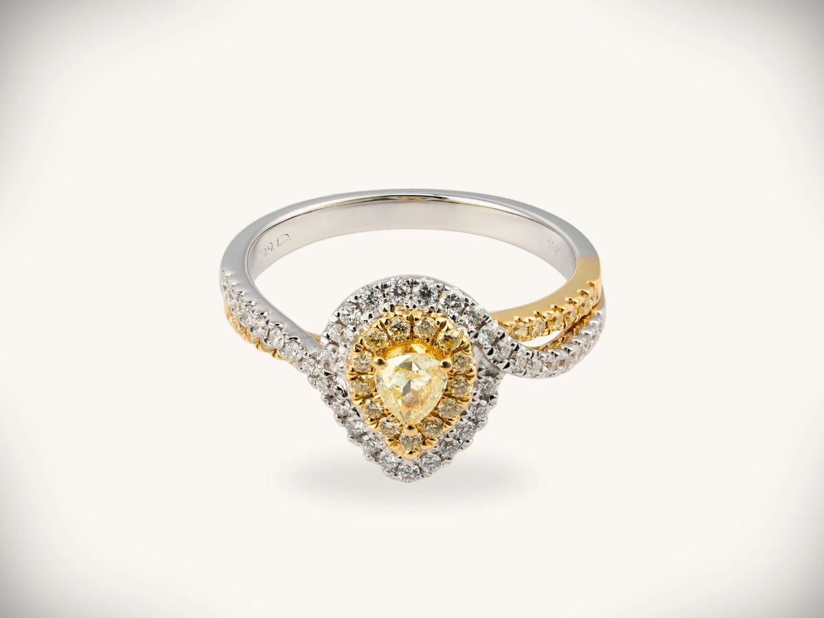18K yellow gold diamond halo ring with 0.69ctw yellow pear diamond