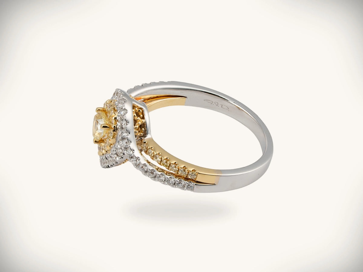 18k yellow and white gold diamond halo ring with 0.69ctw yellow diamond