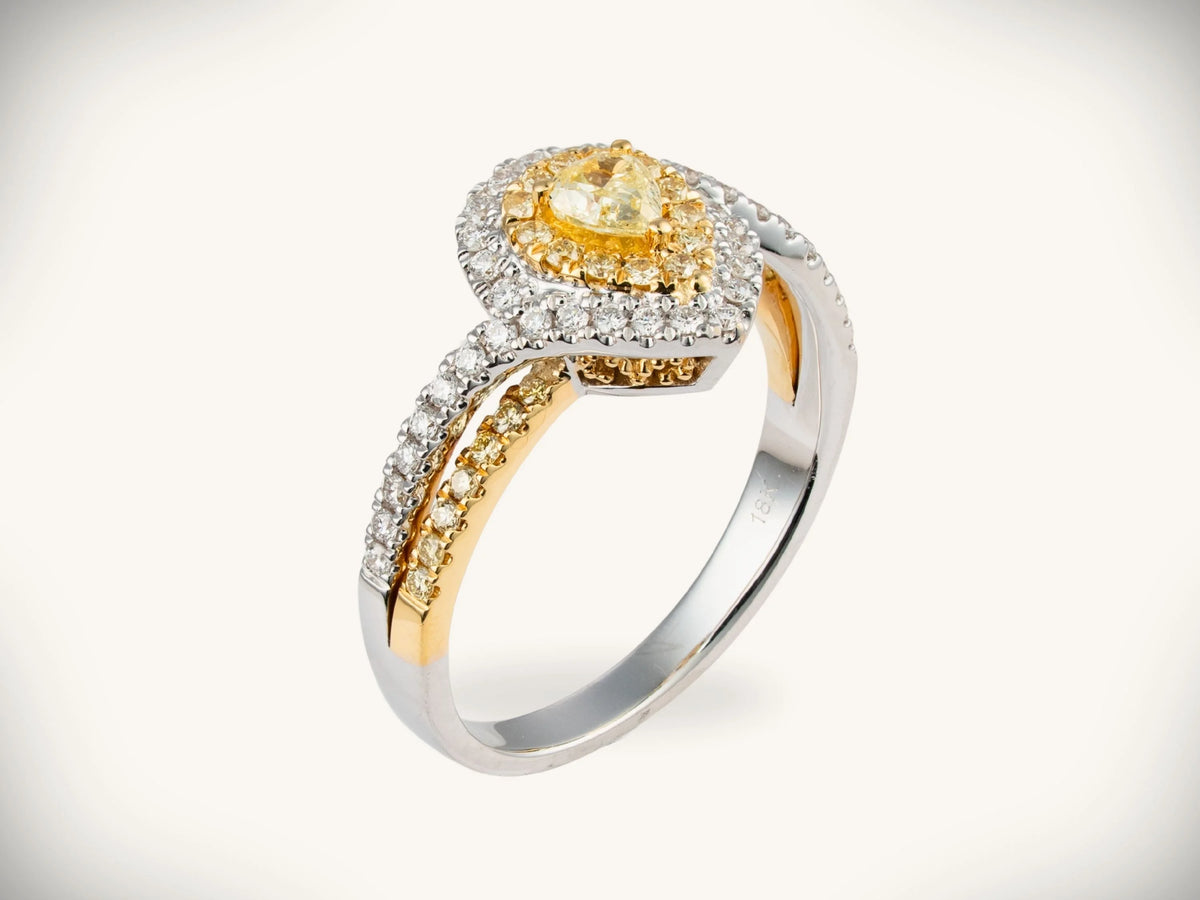 18K yellow and white gold diamond halo ring with 0.69ctw yellow diamond