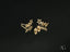 Gold star-shaped stud earrings with screw-back closures from 3 Stars Earrings collection