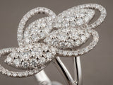 Close-up of 18K white gold diamond statement ring craftsmanship - ArtGold Jewelry