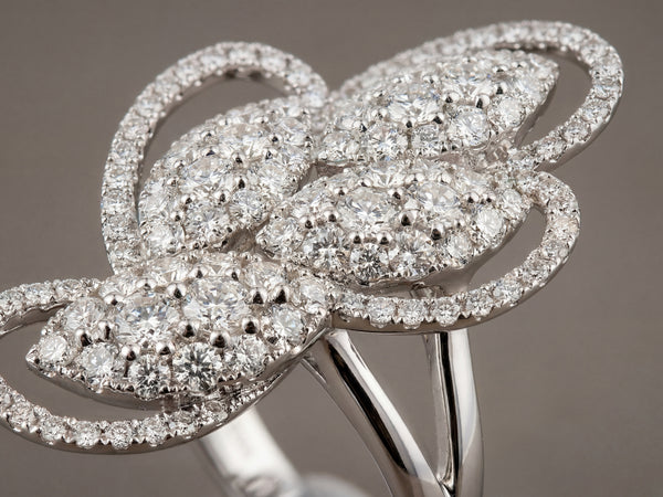 Close-up of 18K white gold diamond statement ring craftsmanship - ArtGold Jewelry