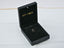The 18 k gold cat pendant presented inside a black gift box, ready for gifting.