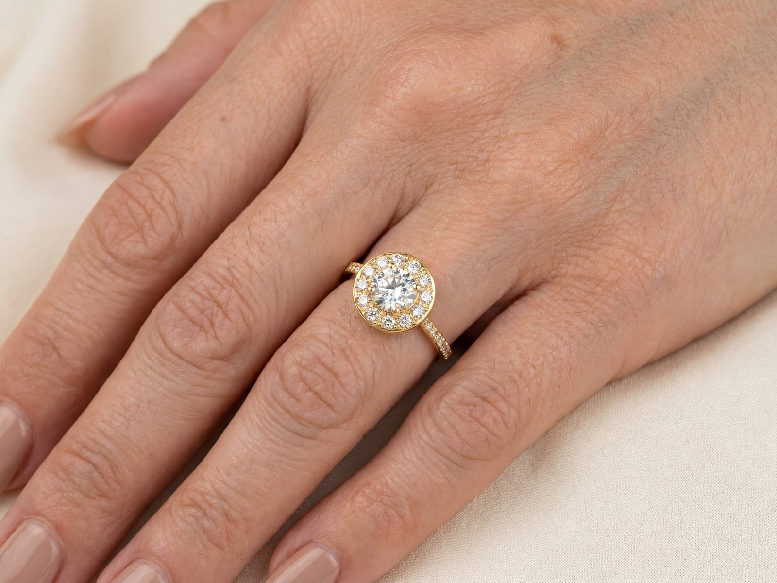 Estrela halo ring worn on hand — 18K gold everyday luxury by ArtGold Everett