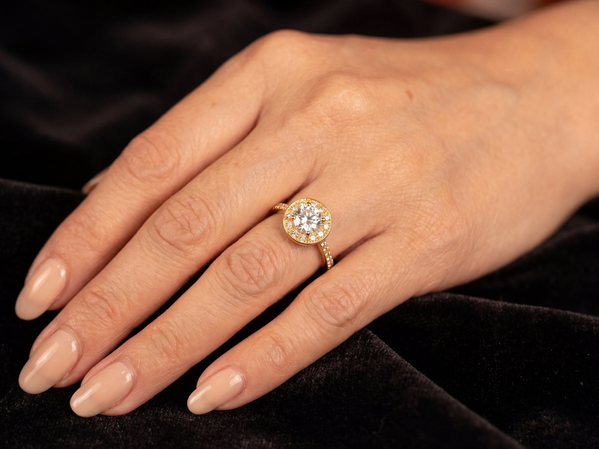 Estrela diamond halo engagement ring worn — editorial style, ArtGold handcrafted