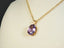 18k gold Amethyst Glow Pendant featuring an oval purple amethyst gemstone