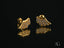 Gold angel wing earrings with embedded gems, a stunning piece of art gold jewelry