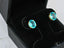 Azure Embrace Earrings featuring Oval Blue Topaz set in 18k Gold with CZ Halo