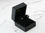 18k White Gold Blue Topaz Stud Earrings in a black jewelry box, elegant art gold jewelry