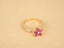 Gold Ruby Flower ring featuring marquise-cut rubies in a design of Blooming Elegance