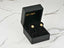 Gold starburst earrings in a black box, Celestial Bloom 18K Gold CZ Flower design