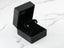 Cross-shaped stud earrings in a black box, showcasing Celestial Cross 18K White Gold CZ