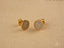 Pair of 18k gold stud earrings with pavé-set cubic zirconia for a celestial glow
