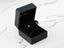 Star-shaped 18K White Gold CZ Earrings in a black jewelry box, art gold jewelry