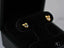 Charming Bow 18k Gold CZ Heart Bow Earrings featuring elegant heart-shaped design