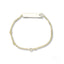 Delicate 18k yellow gold chain bracelet with small rectangular nameplate for boys