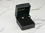 Pearl stud earrings in a black jewelry box for Classic Lustre 18K Gold Pearl collection