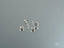 Silver stud earrings with clear stones from Crown Jewel, crafted in 18K solid gold