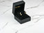 Gold and pearl earrings in a black jewelry box for Dazzle Duo 18K Gold Double CZ Earrings
