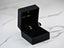 Heart-shaped gold CZ heart drop earrings in a luxurious black velvet box