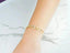 Gold chain bracelet on wrist showcasing art gold jewelry elegance and style