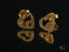 Two gold CZ heart stud earrings with stones from the Double Love art gold jewelry collection
