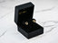 Heart-shaped gold CZ heart earrings in a black jewelry box, Double Love collection