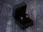 Star-shaped gold earrings in a black jewelry box, Dual Star Earrings, certified 18k solid