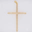Elegant 18k gold cross adorned with dazzling cubic zirconia stones.