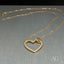 18k Gold Heart Necklace with Zirconia Stones