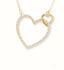 Elegant 18k gold heart necklace with zirconia stones capturing romance and sophistication.