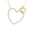 Elegant 18k gold heart necklace adorned with zirconia stones.