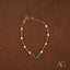 Elegant 18k gold heart and pearl bracelet featuring a delicate gold heart charm